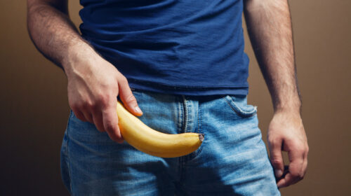 banana-male-penis-size-concept-brown-background